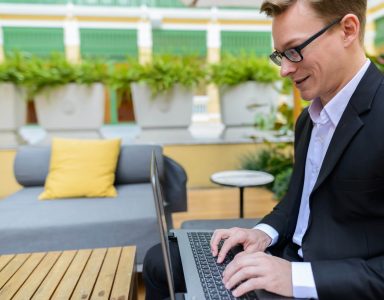 side-view-of-young-happy-caucasian-businessman-usi-2023-11-27-05-30-44-utc-Custom-1.jpg
